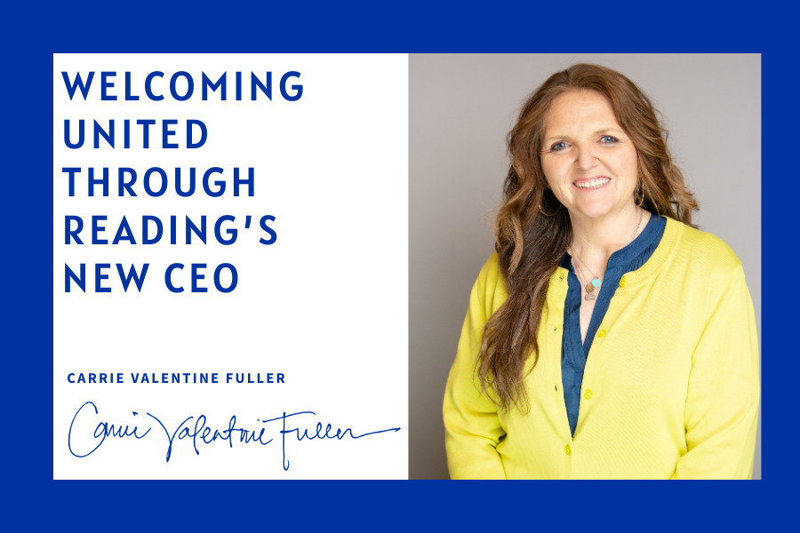 Graphic announcing United Through Reading’s new CEO. On the left, blue text reads “Welcoming United Through Reading’s New CEO” with the name “Carrie Valentine Fuller” and a handwritten signature below. On the right is a portrait of a smiling woman with long wavy brown hair, wearing a bright yellow cardigan over a blue top, standing against a neutral background. The design features a bold royal-blue border.