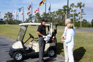 United Through Reading CEO Dr. Sally Ann Zoll chatting with Phil Mickelson on opening day